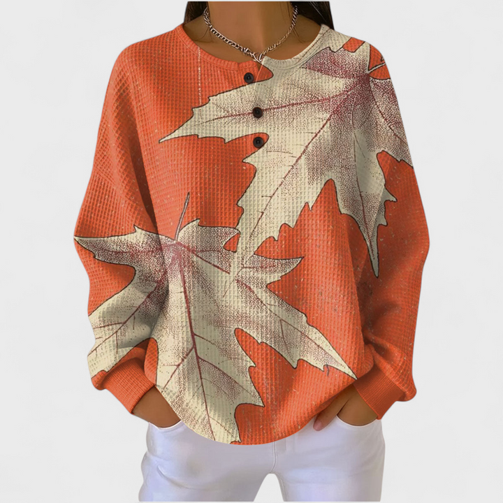 Blusa de malha xadrez feminina de manga comprida e botões. Conforto para a transição de estação.