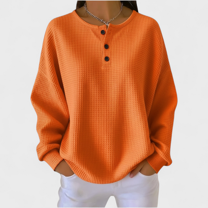 Confortável camisola de malha xadrez feminina com manga comprida e botões. Estilo casual chic.