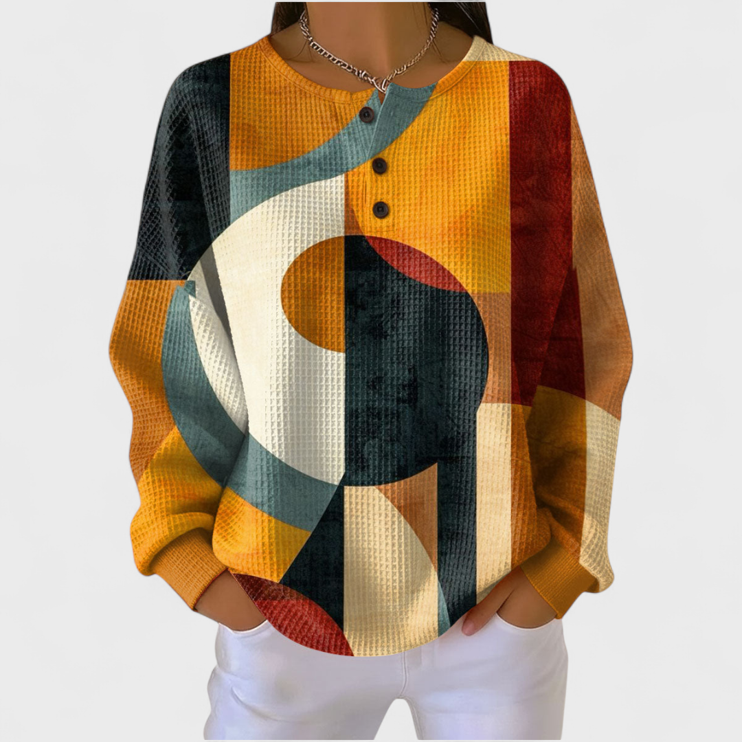 Moda feminina: camisola de malha xadrez, manga comprida e botões. Conforto para dias mais frios.