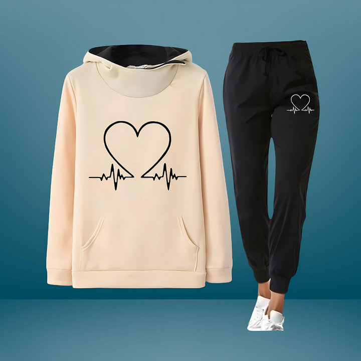 Conjunto feminino desportivo com hoodie e calças jogging. Ideal para conforto diário e moda casual.