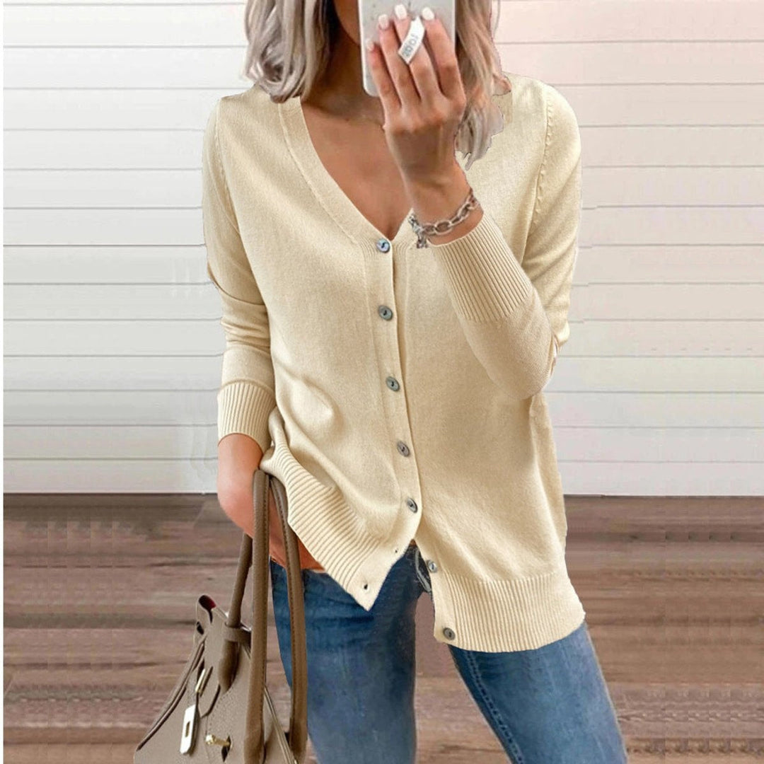 Cardigan de malha feminino, decote V, botões frontais. Confortável e elegante para mulher.