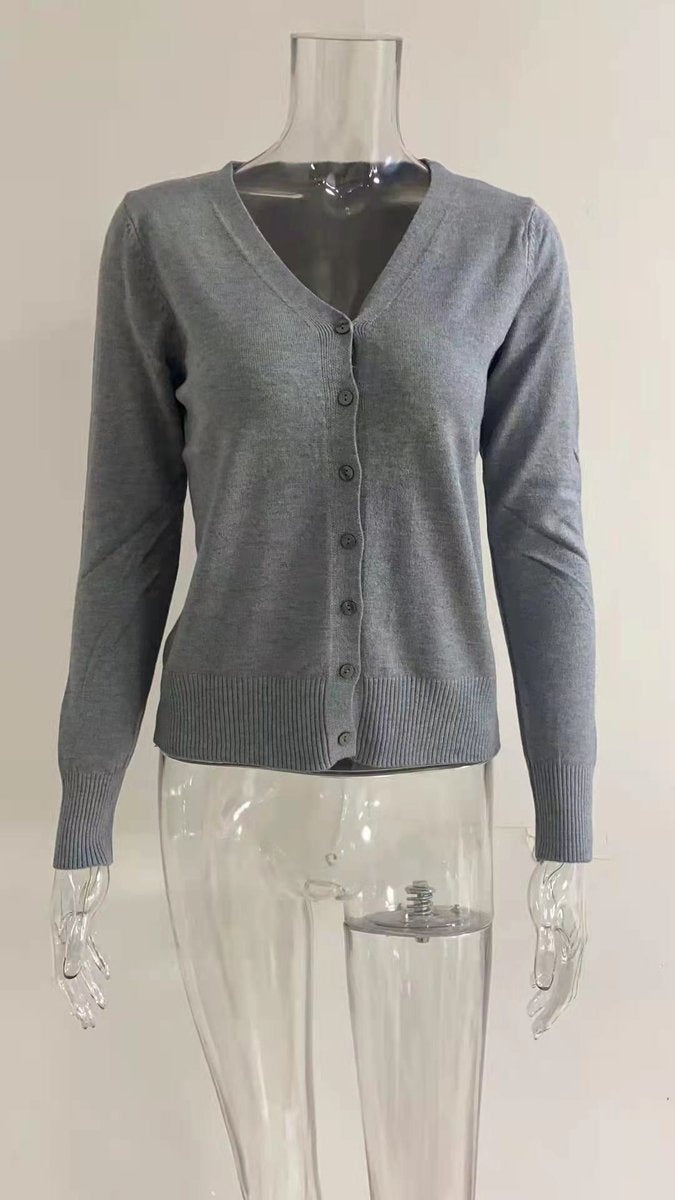 Casaco de malha para mulher, decote V, botões frontais. Estilo moderno para outono/inverno.