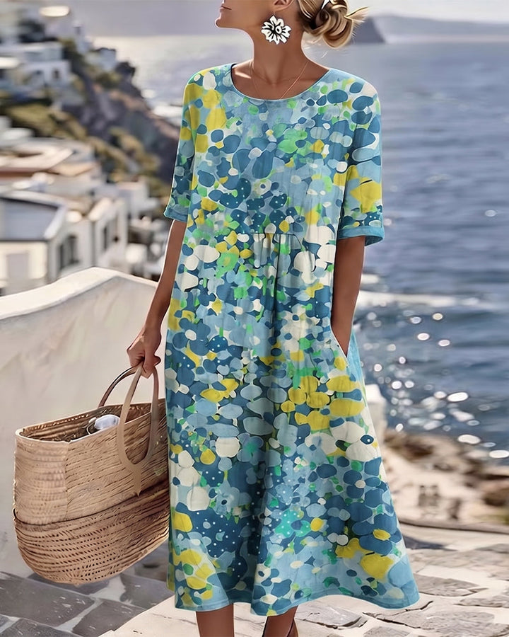 Vestido midi floral feminino, solto, leve e confortável. Perfeito para o verão casual elegante.