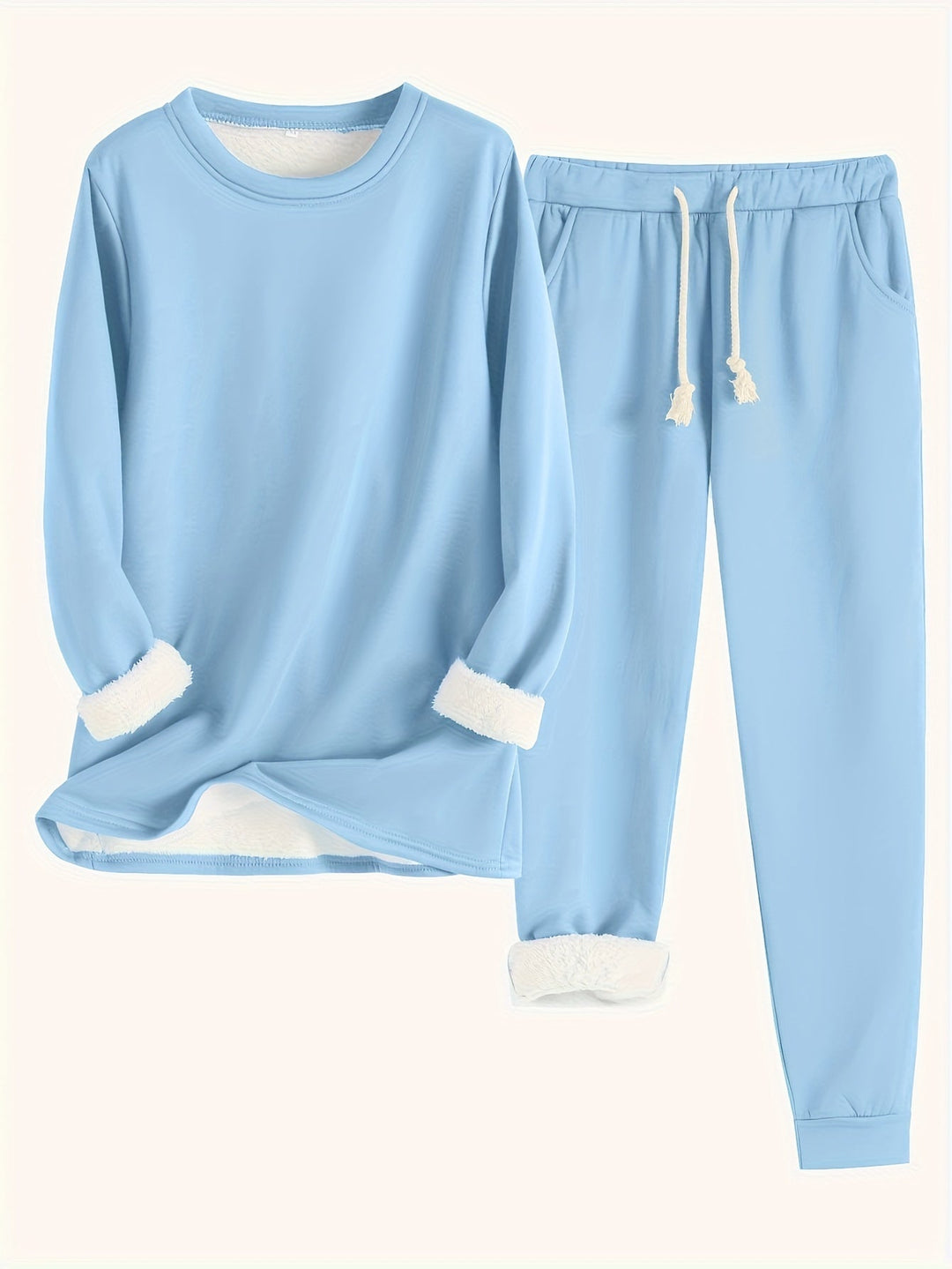 Conjunto feminino estiloso de moletom e calça jogger, perfeito para um look casual chic de inverno.