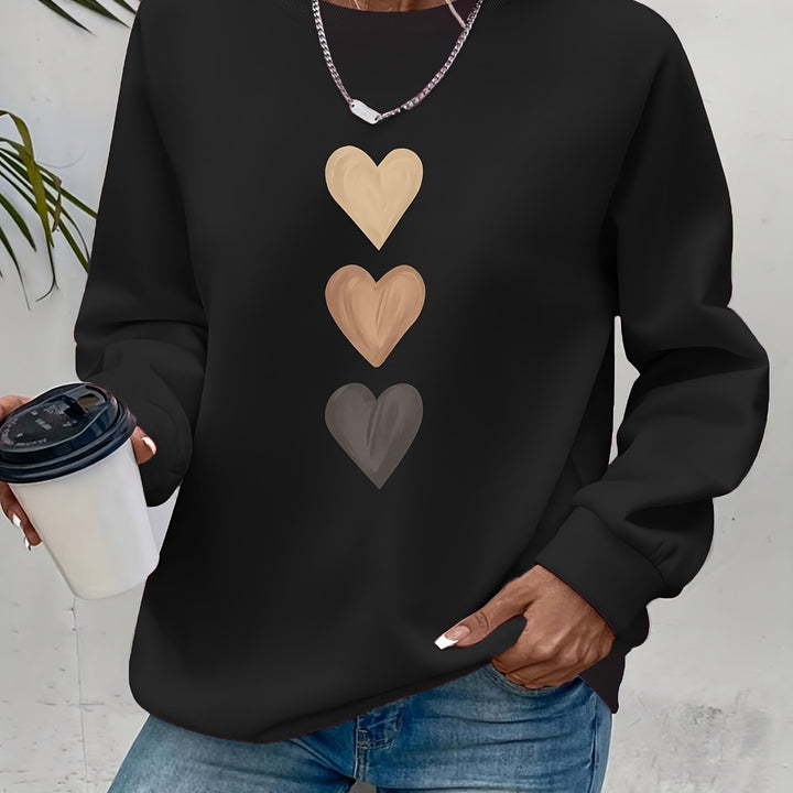 Camisola feminina Amara aconchegante, design moderno de corações, ideal para um visual versátil e elegante.