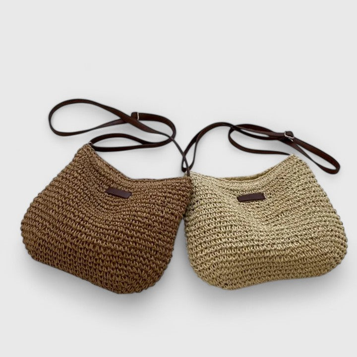 Bolsa a tiracolo trançada para mulher, acessório prático e elegante.