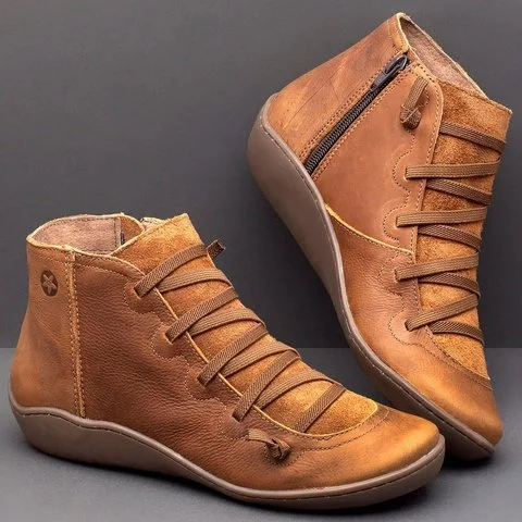 Botas femininas confortáveis cinzas com zíper, oferecendo apoio aos pés e estilo casual para o dia a dia. Sola durável.