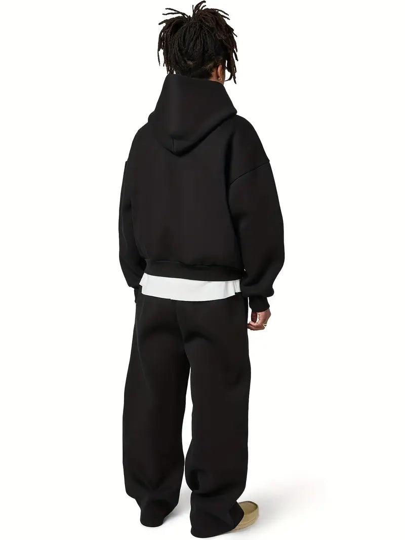 Moderno conjunto treino para homem, com hoodie capuz e calças perna larga. Estilo urbano casual para o dia a dia.
