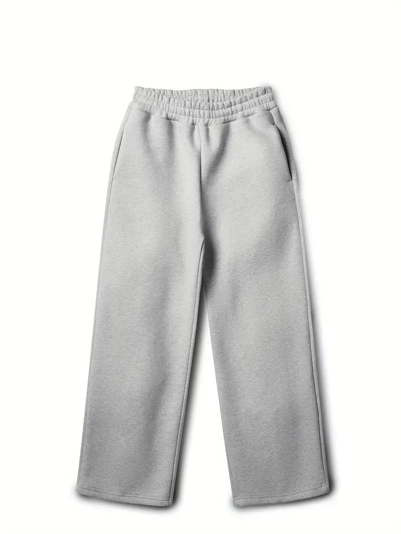 Conjunto treino masculino, hoodie e calças de perna larga, perfeito para o dia a dia e conforto urbano. Moda versátil.