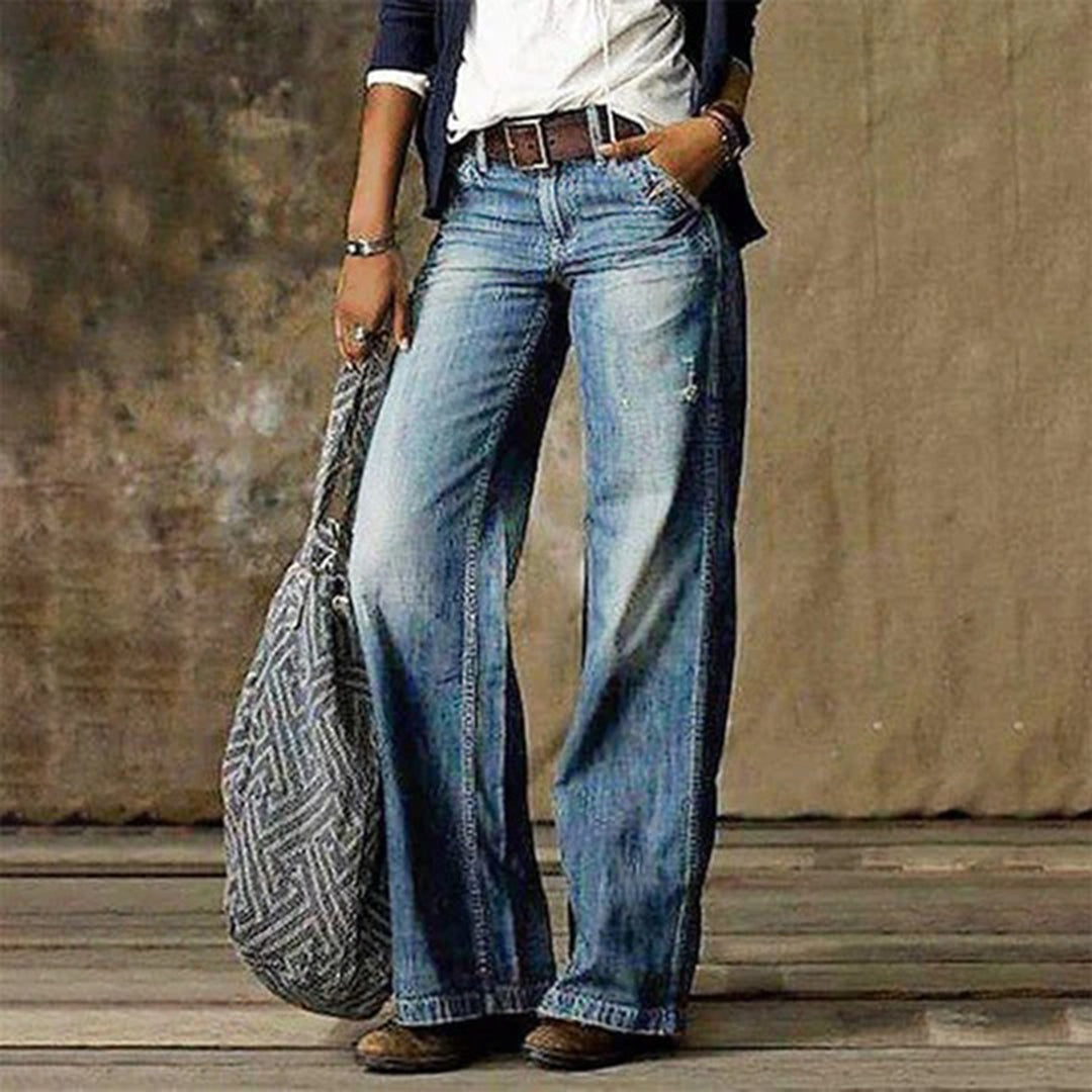 Jeans feminina perna larga vintage, cintura média azul claro. Estilo casual e confortável para moda feminina.