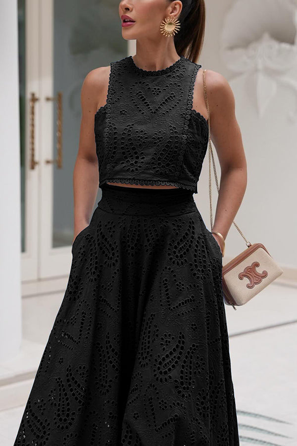 Conjunto feminino chique para festas: saia midi cintura alta e top bordado.