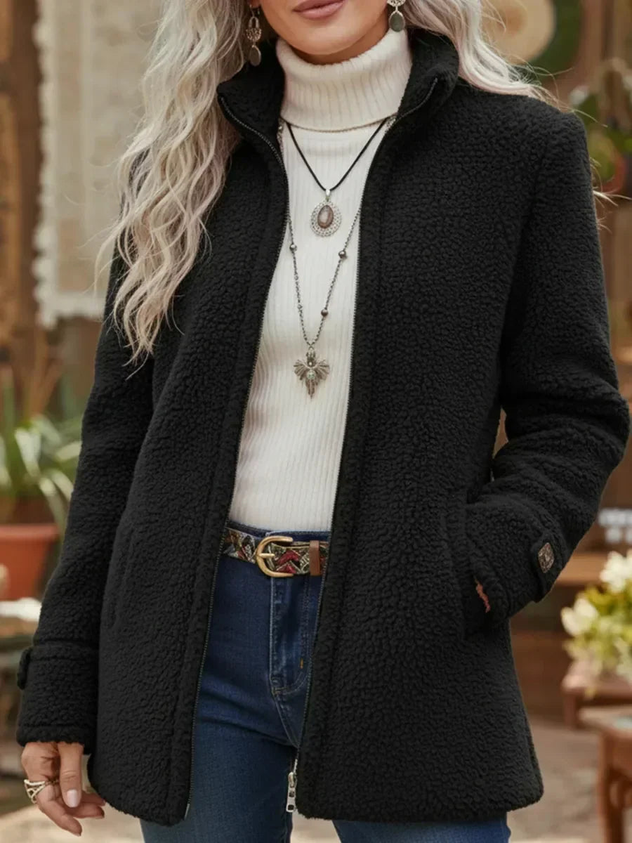 Casaco feminino intermédio com fecho completo, design elegante e moderno. Ideal para conforto no outono inverno.