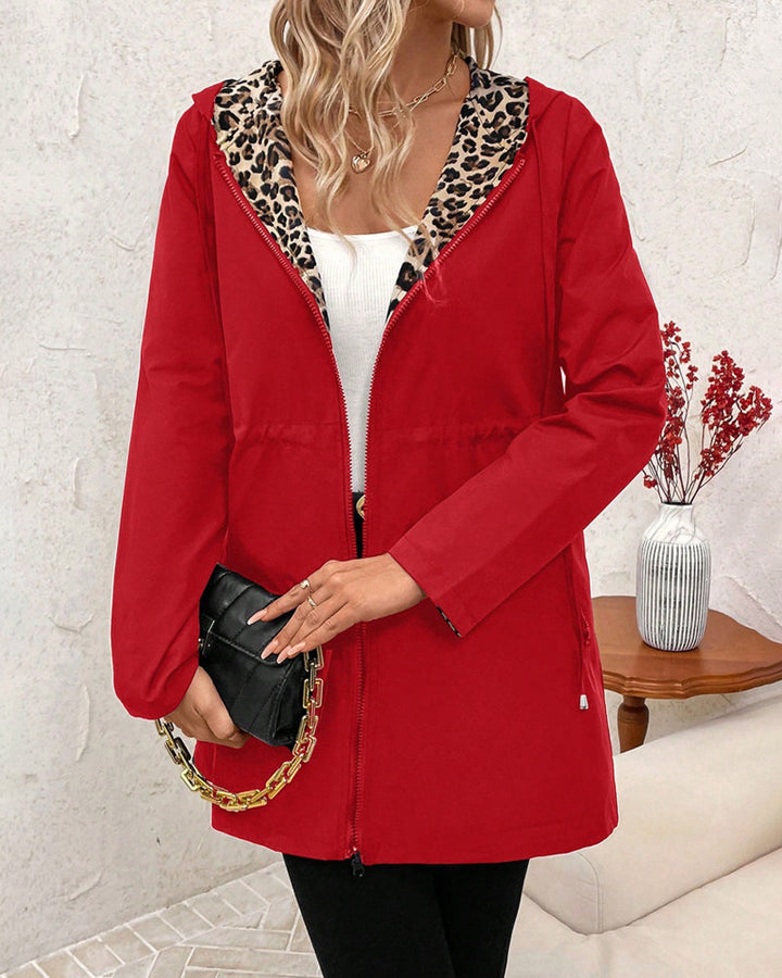 Casaco feminino Vivianne, reversível e com capuz, para um look outono/inverno versátil.