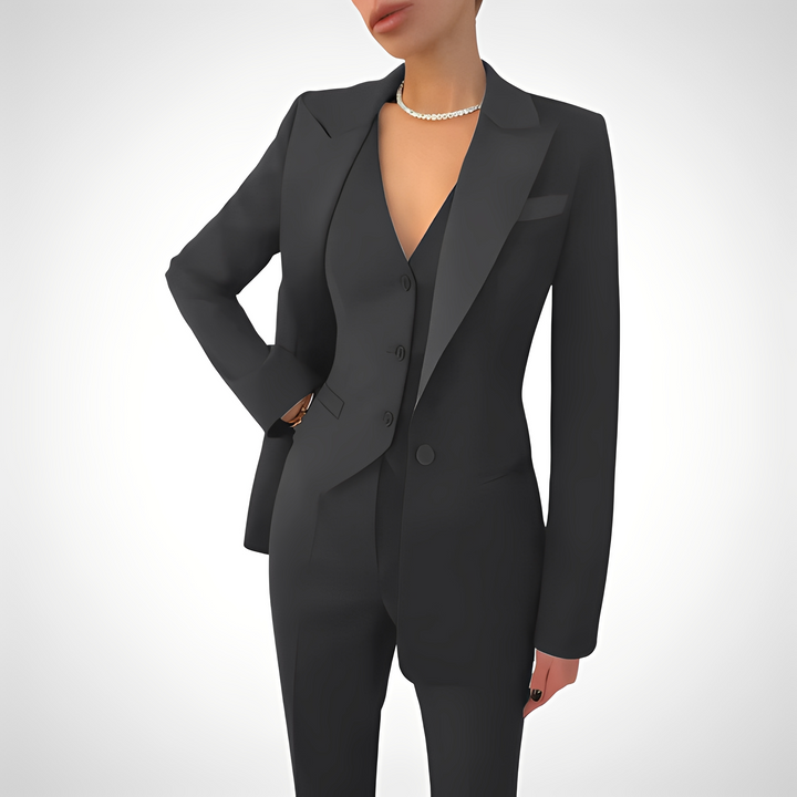 Conjunto feminino elegante de três peças ajustado. Ideal para trabalho ou eventos especiais, estilo moderno e sofisticado.