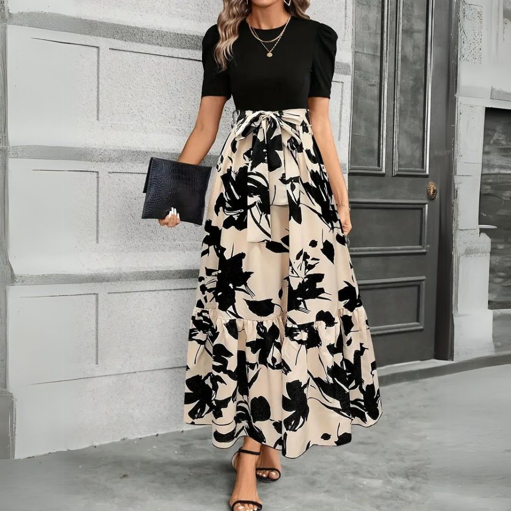 Vestido longo de verão feminino, com design fluido e elegante. Perfeito para conforto e estilo na moda feminina.