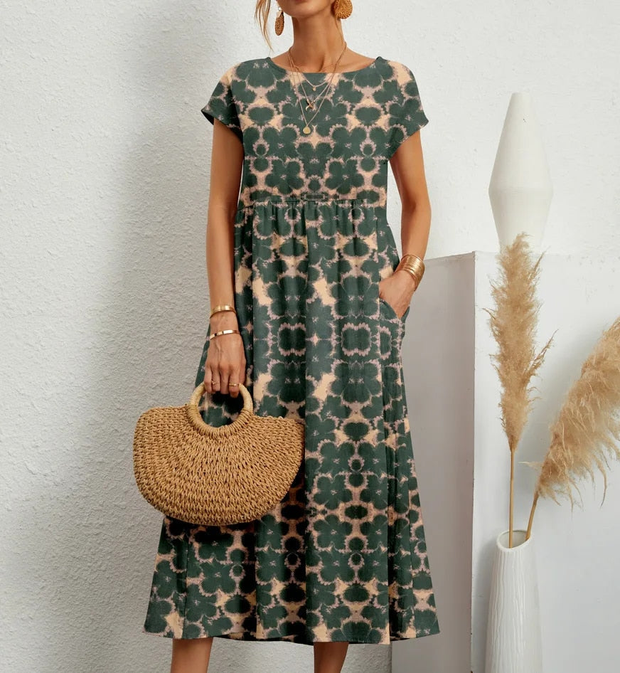 Vestido longo floral feminino de verão, com corte A e manga curta. Elegante e confortável para mulher.