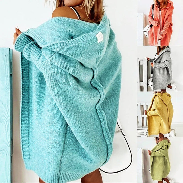 Casaco de malha feminino oversize com capuz, ideal para o inverno e outono, proporcionando conforto e estilo.