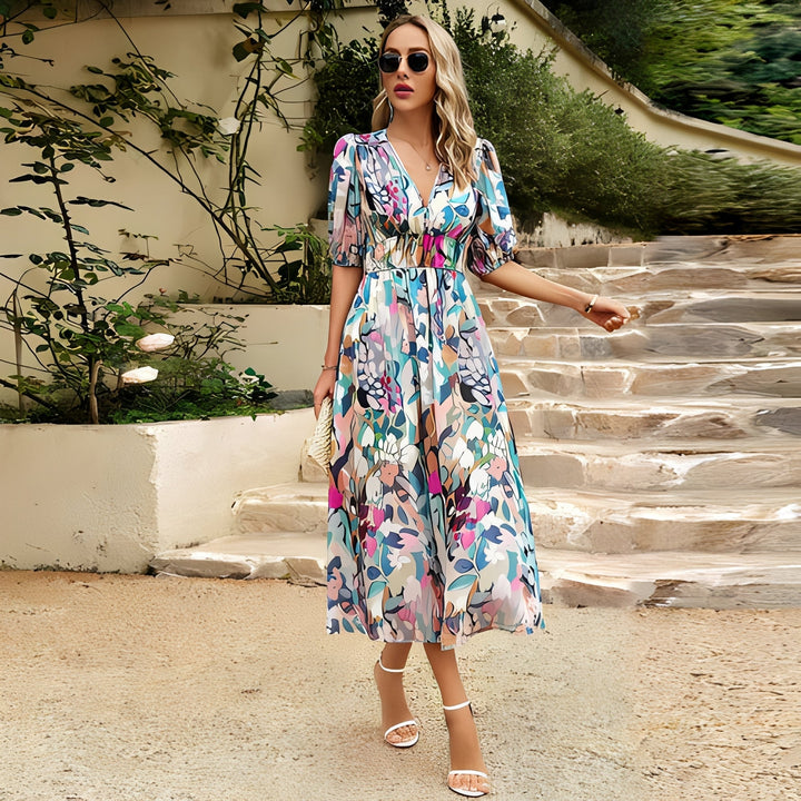 Vestido de verão feminino estampado com decote V. Moda midi elegante para primavera, combinando estilo e conforto.