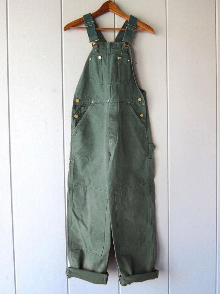 Jardineira de algodão feminina de corte largo, alças ajustáveis. Roupa confortável, moda casual mulher.