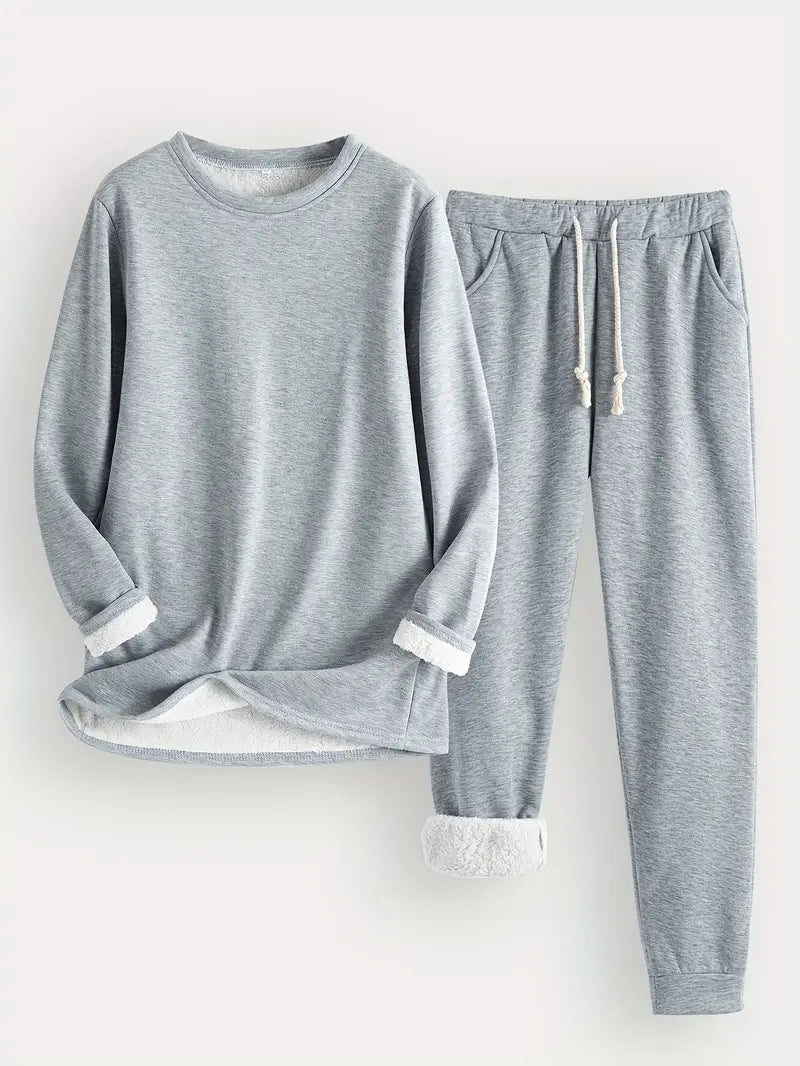 Conjunto feminino aconchegante de moletom e calça jogger, essencial para dias frios e momentos de descanso.