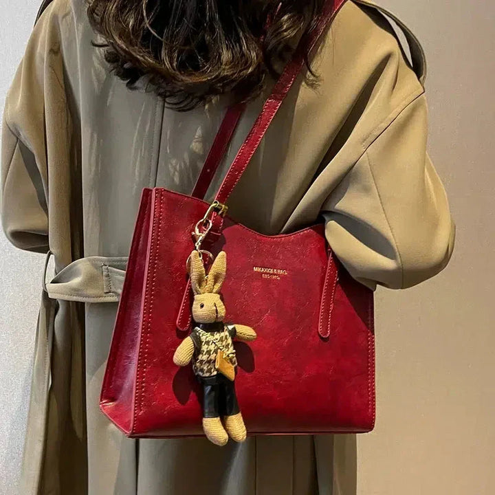Bolsa de ombro clássica Lena, couro vegano durável, acessório indispensável para a moda feminina.