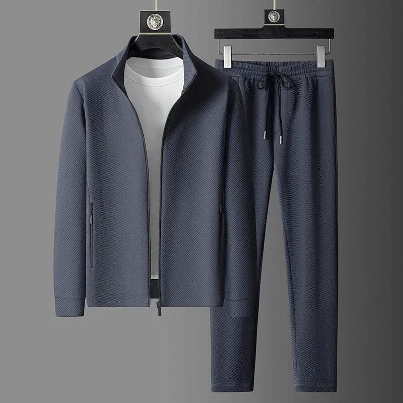 Fato de treino masculino completo em malha preta, ideal para desporto ou uso casual, oferecendo conforto e estilo ativo.