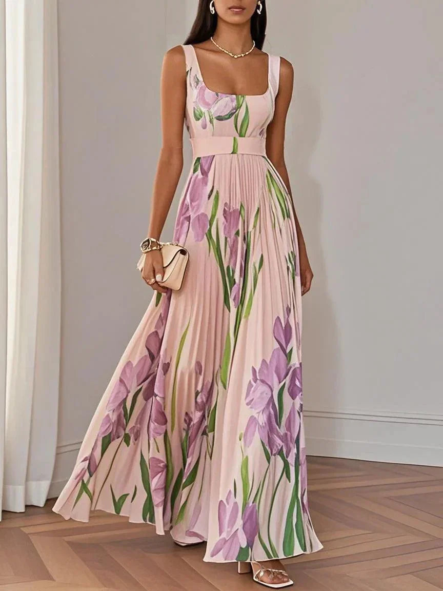 Vestido longo floral plissado, leve e feminino para o verão. Roupa elegante e confortável para diversas ocasiões.