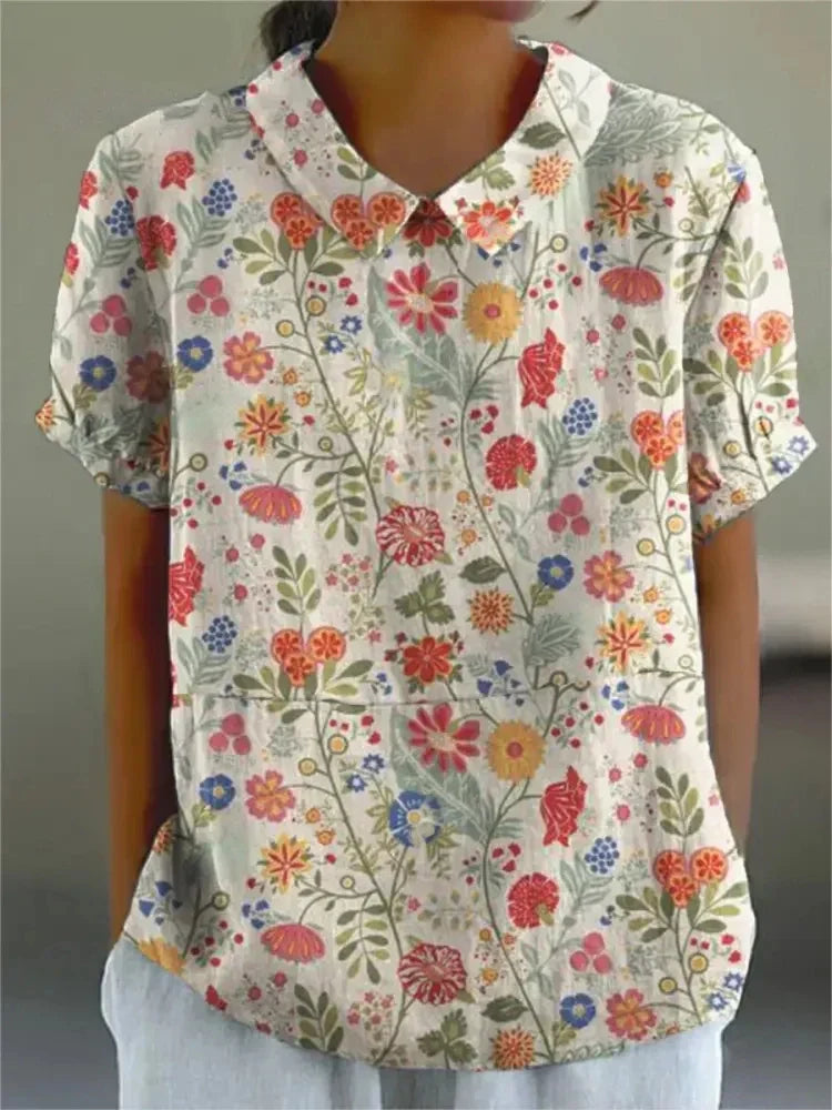 Camisa estampada floral para mulher, versátil. Conforto e estilo para moda feminina casual.