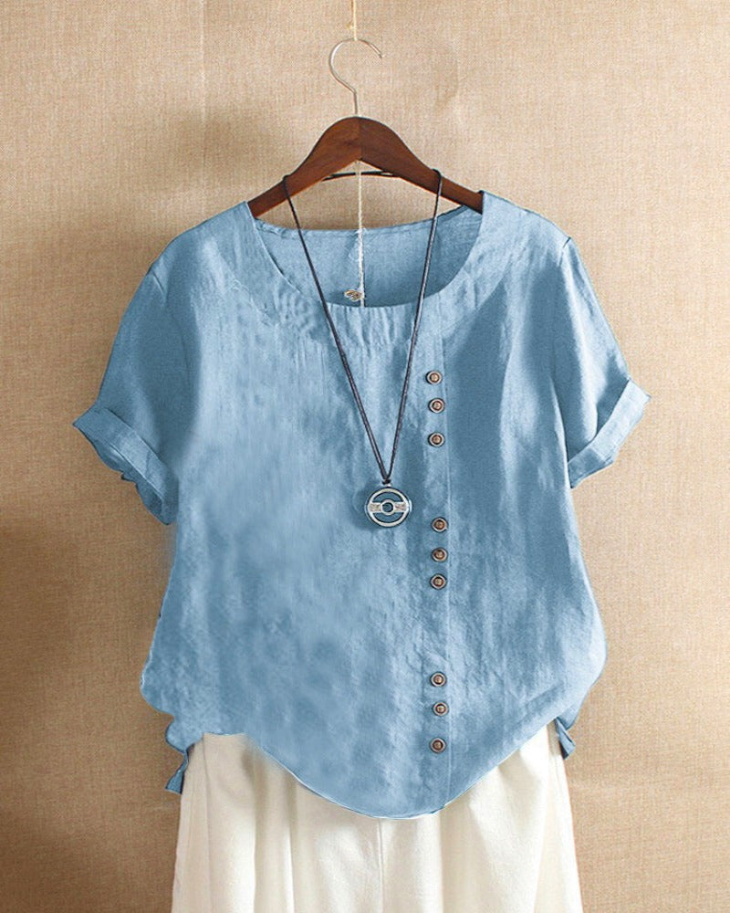 Blusa feminina de manga curta, gola redonda, estilo casual-elegante. Ideal para looks de verão.