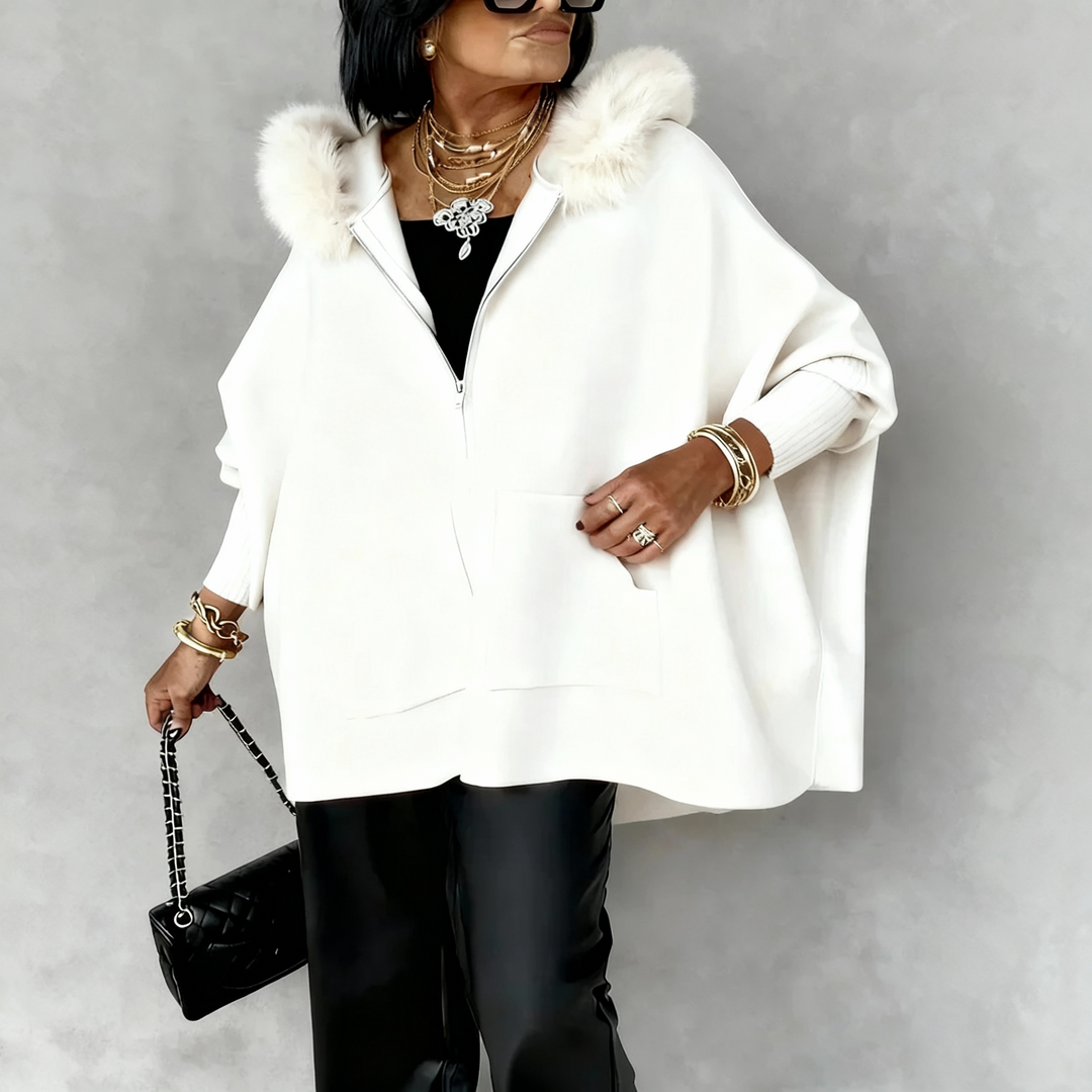 Roupa feminina: Capa elegante e quente para o inverno. Ideal para um look sofisticado nos dias frios.