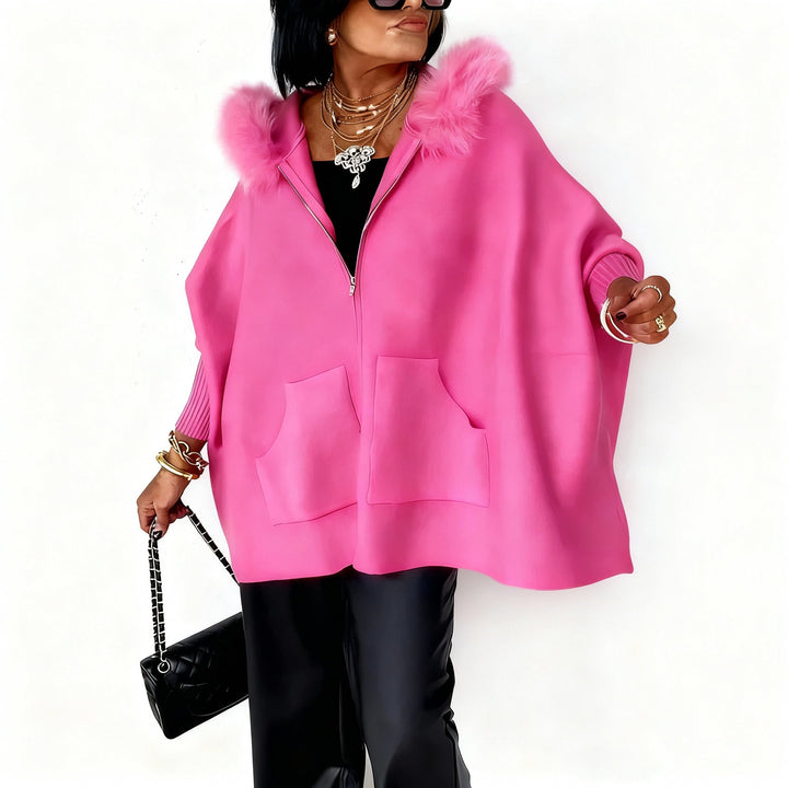Capa feminina elegante e quente para o inverno. Ideal para um look sofisticado e confortável.