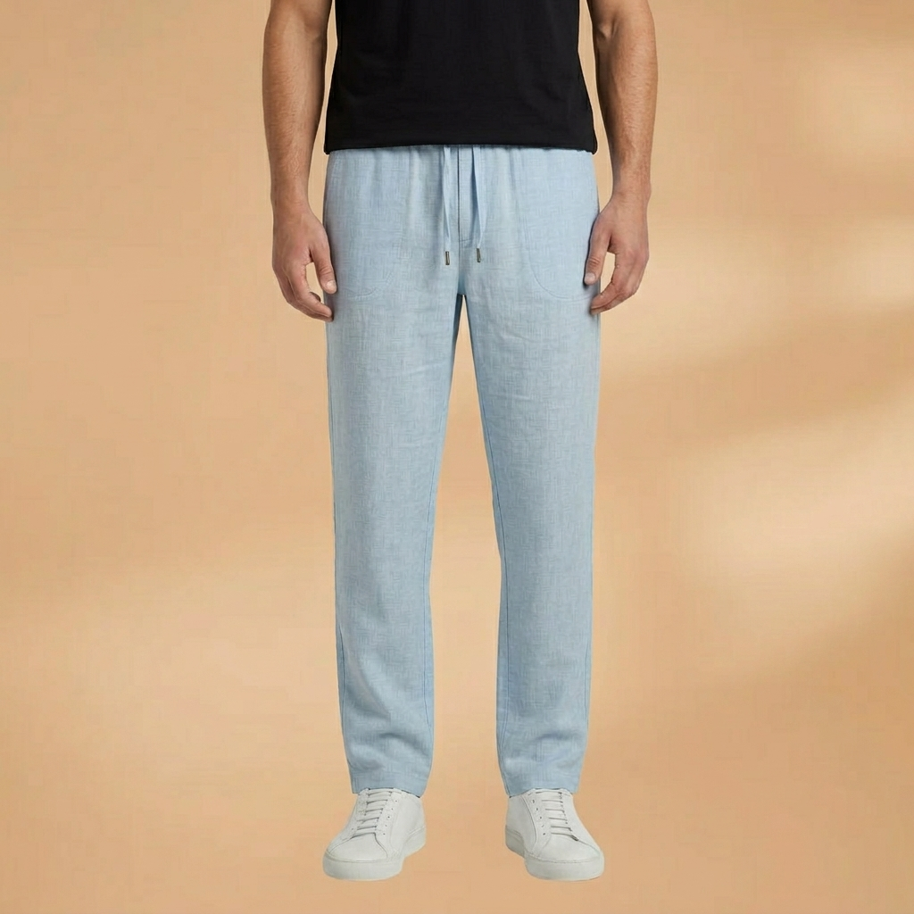 Modelo veste calças de linho masculinas perna reta, estilo moderno e elegante para o verão. Peça casual e respirável.