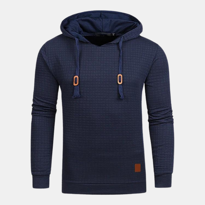 Moletom masculino de textura padrão e capuz ajustável. Peça essencial para o estilo casual de inverno.