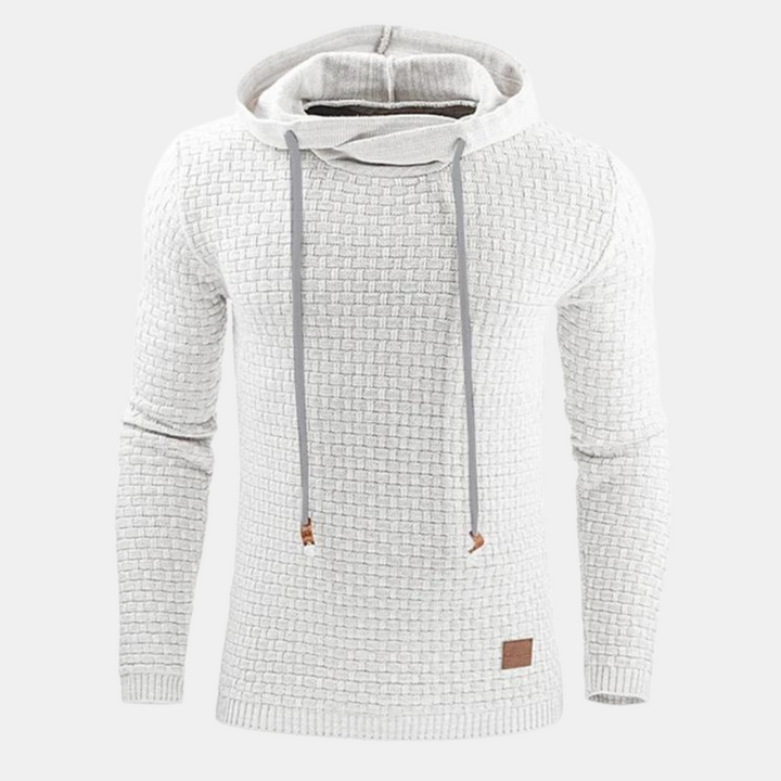 Moletom com capuz ajustável e textura padrão. Perfeito para o homem que busca estilo e conforto.