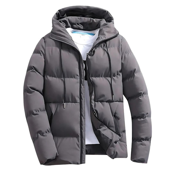 Agasalho parka masculina de inverno, acolchoado e com capuz, oferece proteção contra o frio e estilo desportivo.