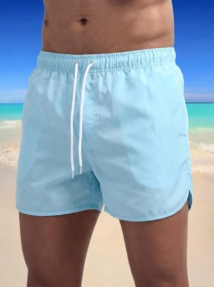 Calção de banho masculino de secagem rápida, ideal para praia e piscina, com conforto e estilo para o verão.