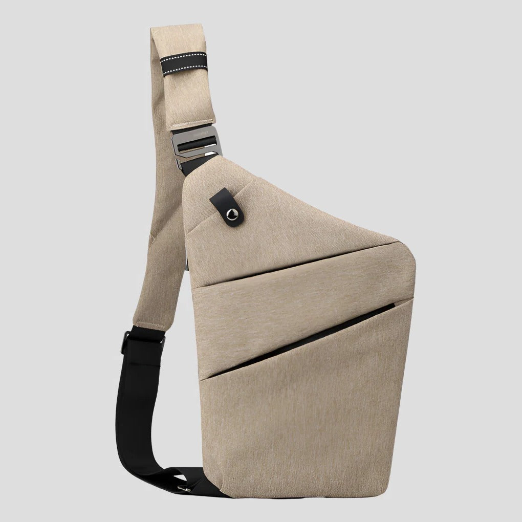 Bolsa compacta antifurto unissexo. Ideal para transportar portátil e essencial para segurança na cidade.