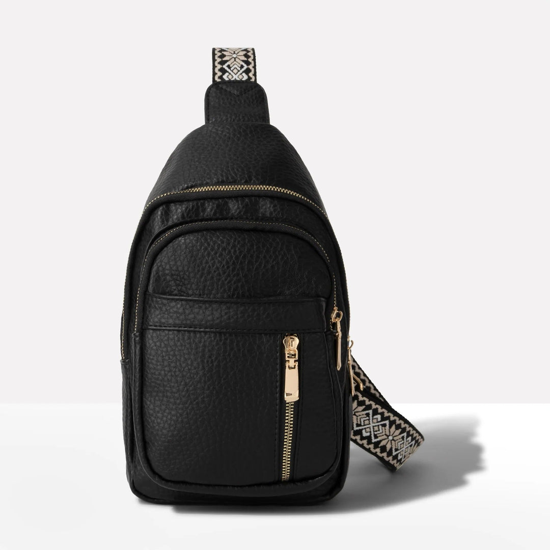 Bolsa transversal unissex antirroubo preta. Compacta, elegante e segura para o dia a dia, com espaço para tudo.