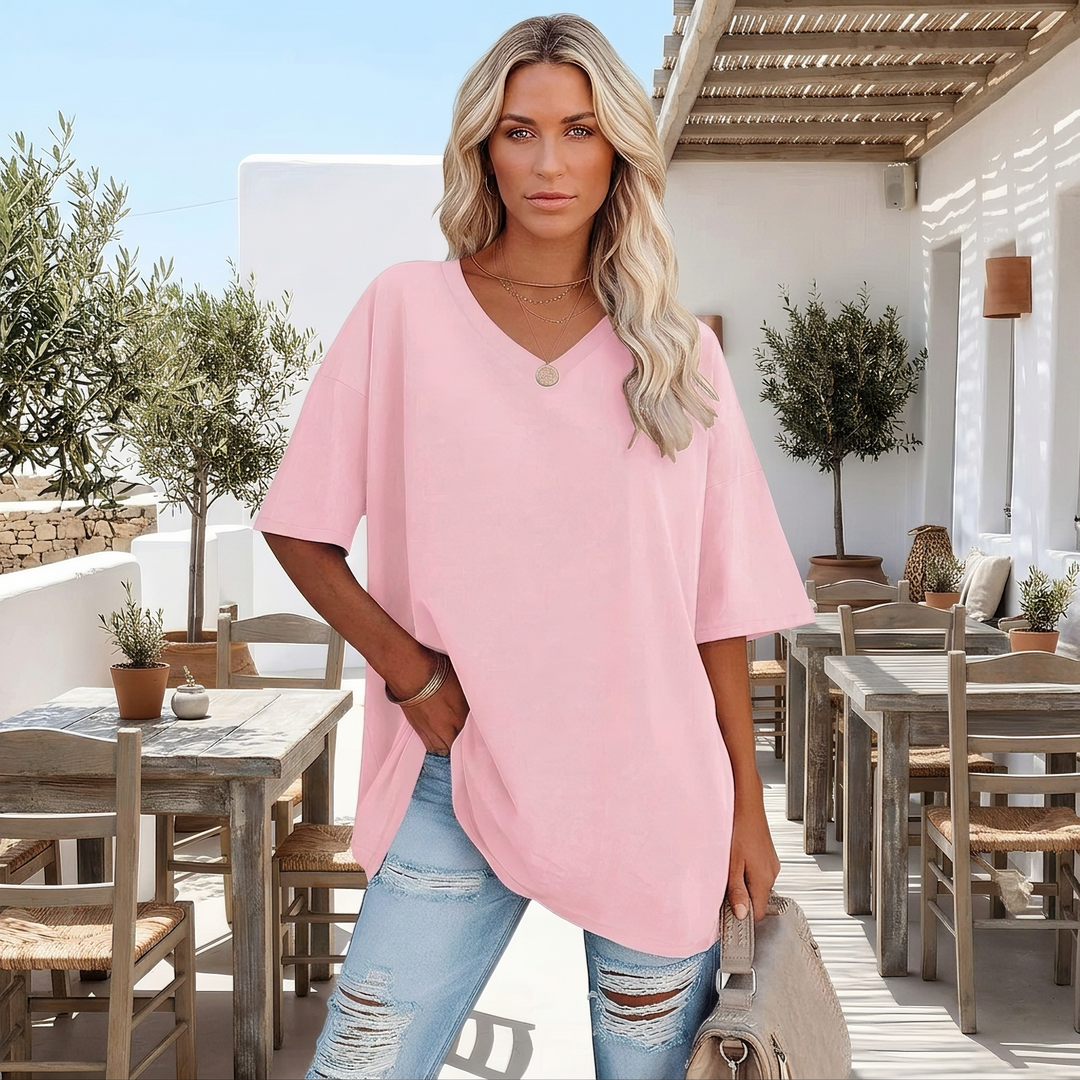 Camiseta feminina oversized casual de verão em algodão, ideal para conforto diário.