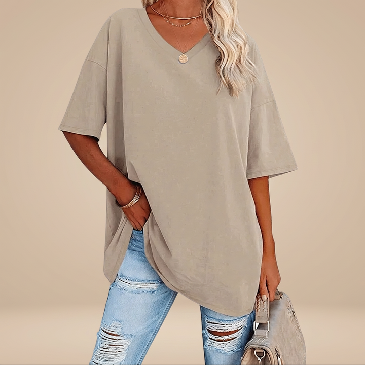 Camiseta feminina oversized de verão em tecido leve, ideal para o casual e praia.