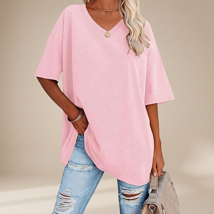 Camiseta feminina oversized de verão em cor vibrante, para moda praia e casual.