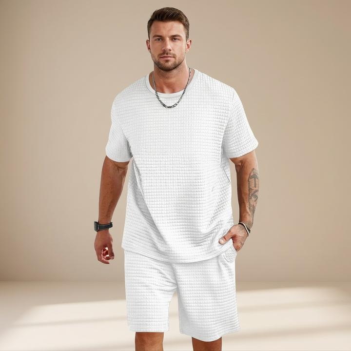 Conjunto masculino casual de waffle cinza, shorts e camiseta para conforto e estilo diário no verão.