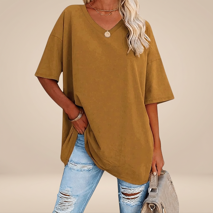 Camiseta feminina oversized para moda praia e verão, estilo casual e confortável.