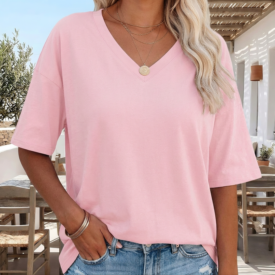 Camiseta feminina de verão oversized, perfeita para o calor, com máximo conforto e estilo.