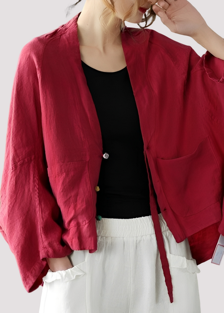 Cardigã feminino casual folgado com bolsos, ideal para outono e primavera. Conforto e estilo versátil.