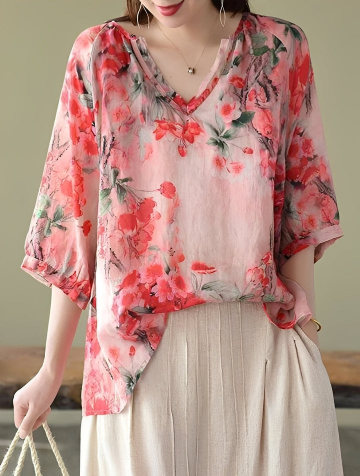 Blusa feminina elegante Nancy com estampa moderna, decote V solto. Perfeita para verão casual e confortável.
