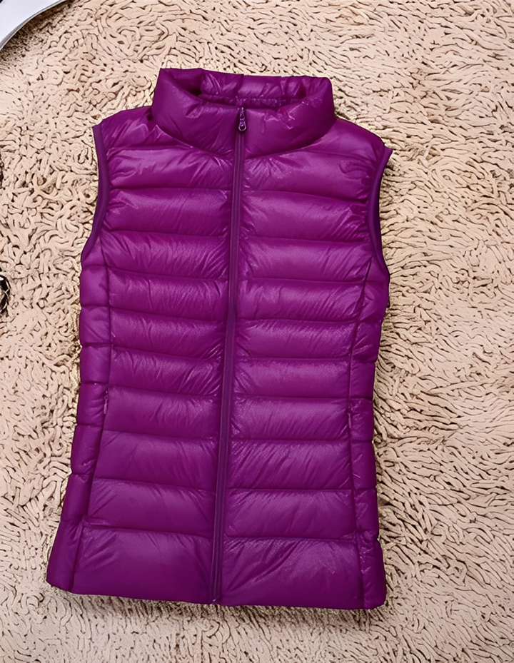 Colete feminino elegante, ultraleve e fácil de combinar. Perfeito para outono/inverno com muito estilo.