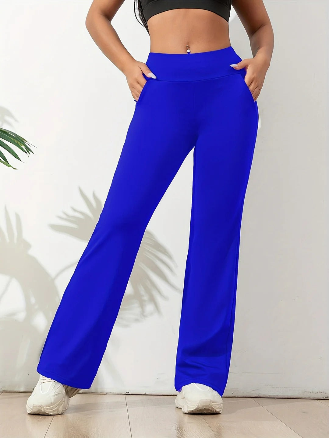 Calças femininas casuais de cintura alta e boca larga. Perfeitas para verão e moda elegante.