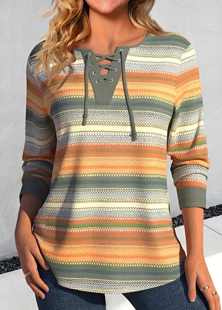 Camisa feminina elegante de manga longa, ideal para o escritório ou look casual. Blusa versátil para outono.