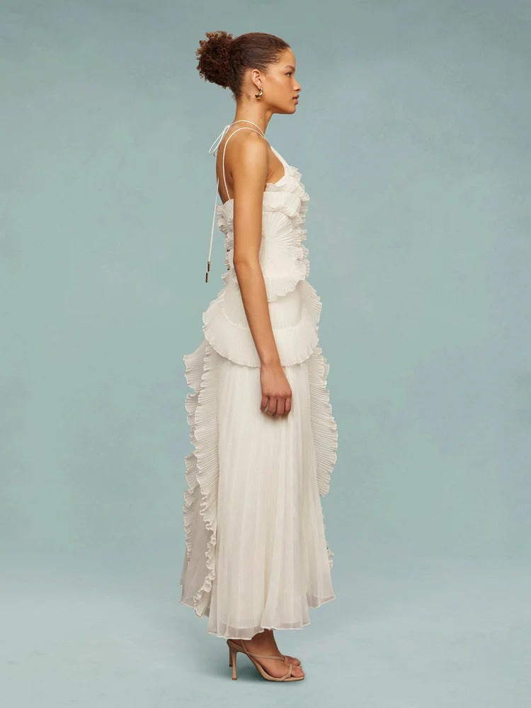 Vestido formal de festa com decote halter, babados e caimento longo impecável.